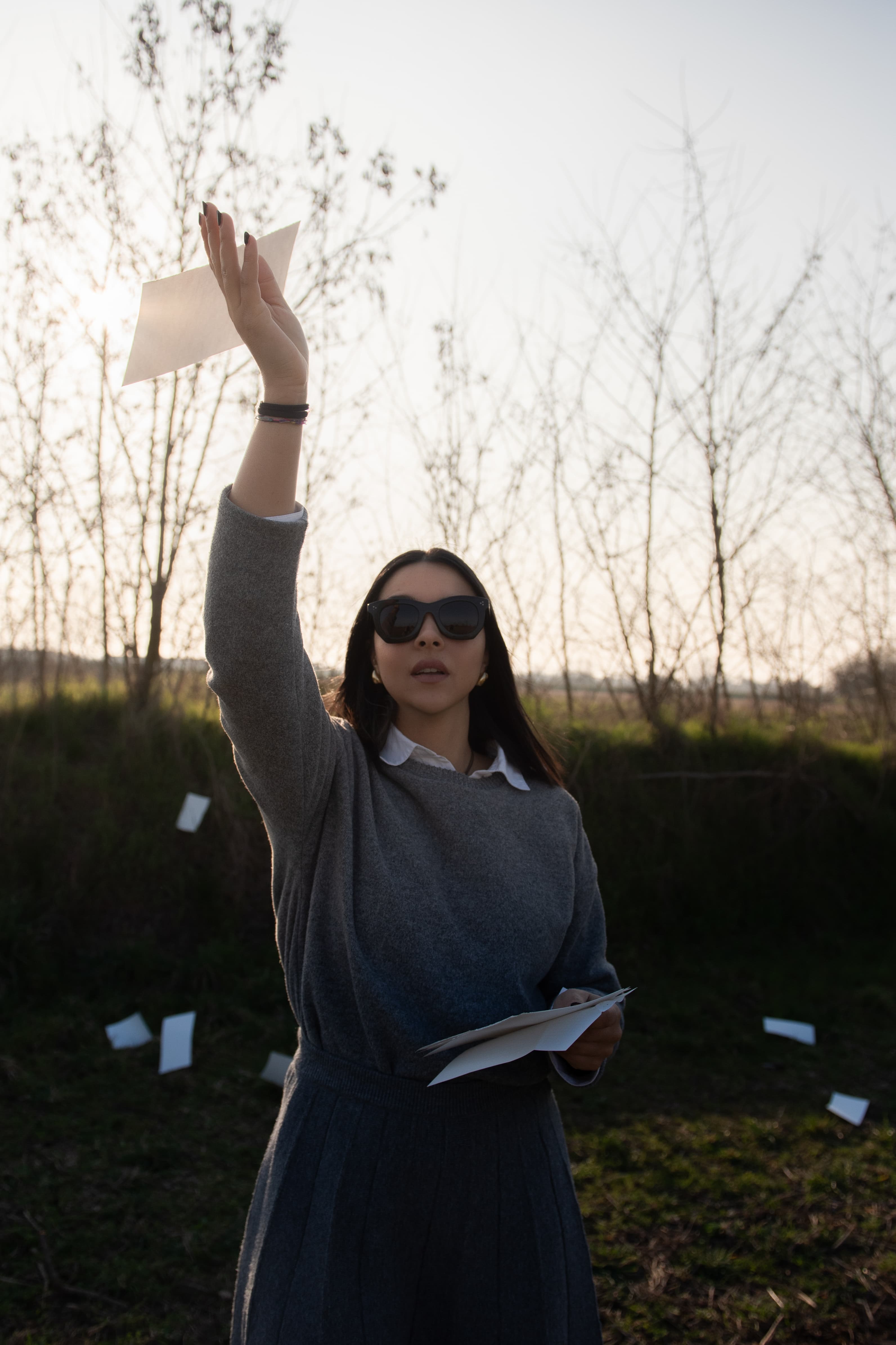A woman letting the paperwork go